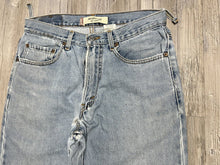 Load image into Gallery viewer, Vintage 90s Men’s Levi’s 550 Jeans – Stonewash, Relaxed Fit, Thrashed - Size 31x34 – Made in USA